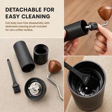 Slow Mill Manual Coffee Grinder Pro disassembled for cleaning with brush and burr parts