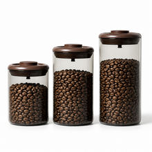 Slow Mill coffee bean canisters in three sizes