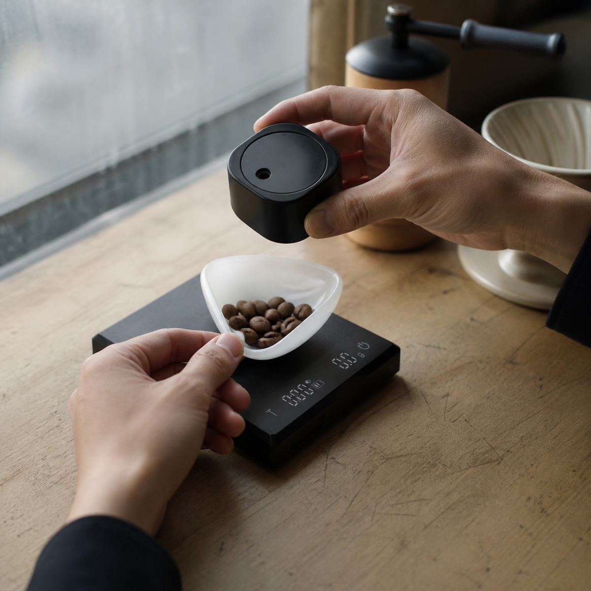 Black mini coffee scale set used for weighing coffee beans
